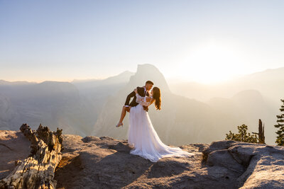 couple standing on the cliffs in colorado taken by Minnesota wedding photographer Marcus Hanenburg Photography