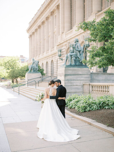 couple walking at their Old Courthouse wedding in Cleveland