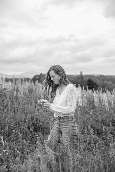 Photo of girl in flower field  | Senior Portraits