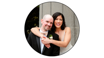 A nashville bride with her arms around her groom