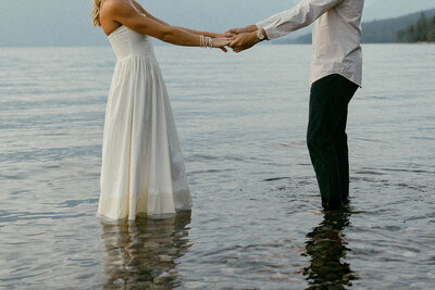 Couple gets in Lake McDonald for their engagement session
