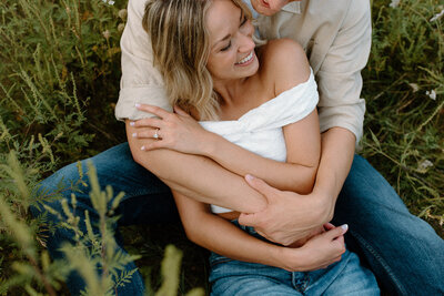 spring couples engagement session in an Indiana wild flower field