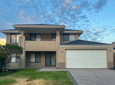 Two-story render house exterior in Falcon