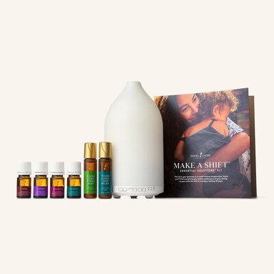 Two bottles of Primally Pure Citrus + Vanilla deodorant on a gray surface