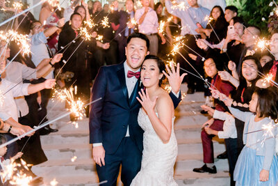 bride and groom during the formal exit with sparklers