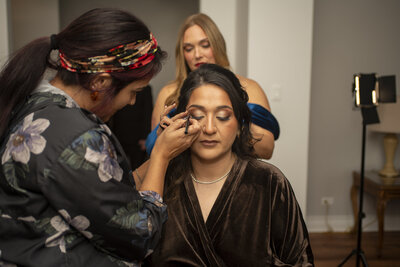 Couple portrait reflecting in water at sunset destination wedding