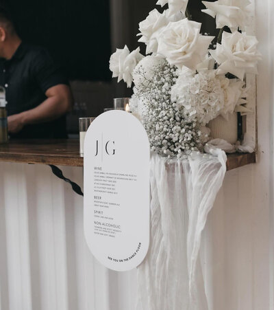 Bar signage for wedding in pastel blue by State of Elliott