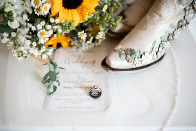 wedding ring and a sunflower bouquet