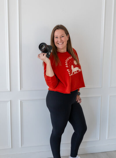 photographer headshot with camera