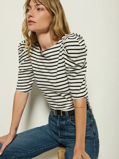 Where flirty meets refined, the Emery Stripe Boat Neck in 100% Organic Cotton completes any look with its subtle sophistication. Including shoulder pads with pleated detailing, a chic boat neckline, and puff sleeve, we love this day to night look. This one comes in Cross Walk Stripe.