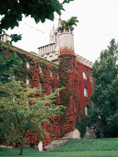 A building with red and green ivy by Katie Stansfield Photography, a Richmond photographer.