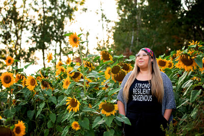 indigenous girl in sunflower field