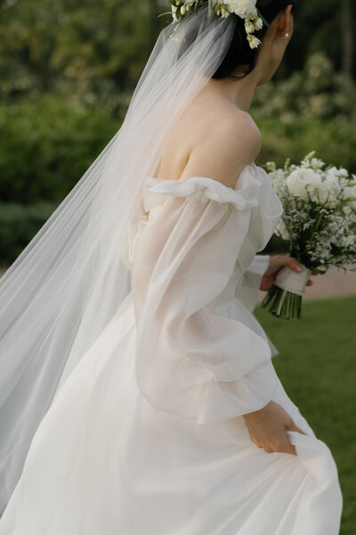 Bride and groom walk up memorial steps at their DC wedding