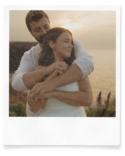 couple embrace on beach for lifestyle session