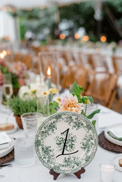 Hand lettered table number on vintage green plate for wedding at Lion Rock Farm in Connecticut