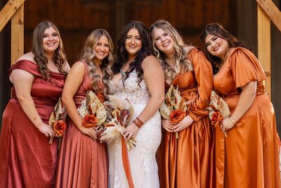 Fall wedding colors orange dresses western bridesmaids East TX wedding
