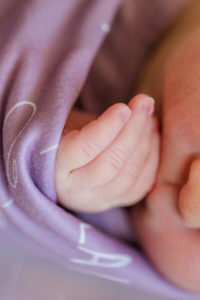 Newborn baby's hand. 