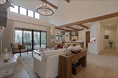 Cozy, neutral great room of Mica View Estates new construction project designed by Coeur d'Alene interior designer Sarro Design.