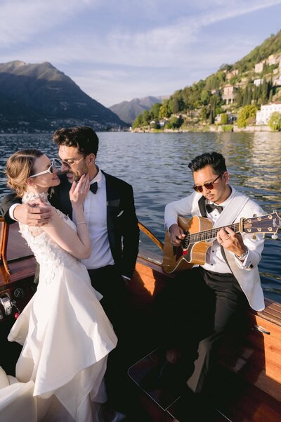 Lake como couple with musician on the boat captured by David Truong