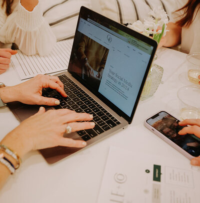 laptop with young woman working
