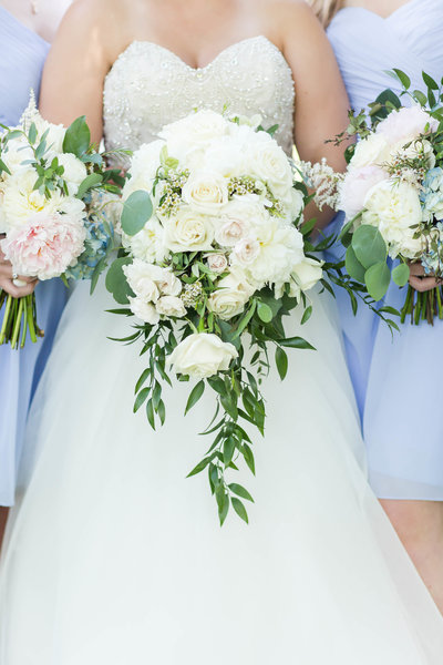 White textured wedding bouquet with greenery crafted by Bouquet Studio and photographed by Loren Jackson Photography at Gervasi Vineyard in Canton Ohio
