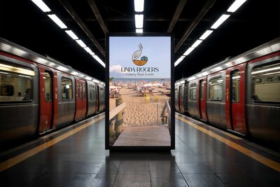 A poster of Linda Rogers Luxury Real Estate in a train station