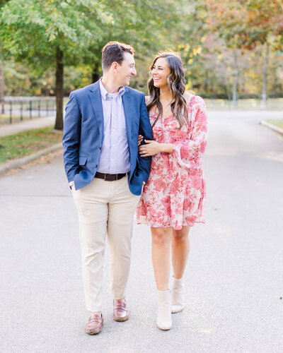 Kelby and Mason dancing by the lake, a stunning engagement moment captured by Abby Bell Photography. Romantic and timeless Alabama engagement photography.
