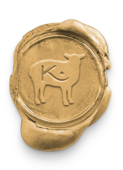 Wax seal with a sheep design and letter K