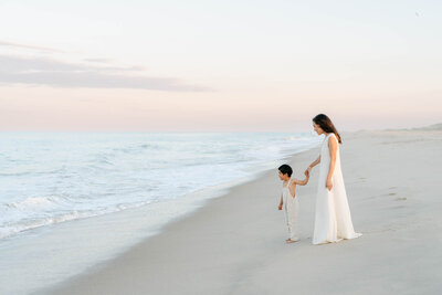 Family cuddles at a Delaware State Park during a family photo session