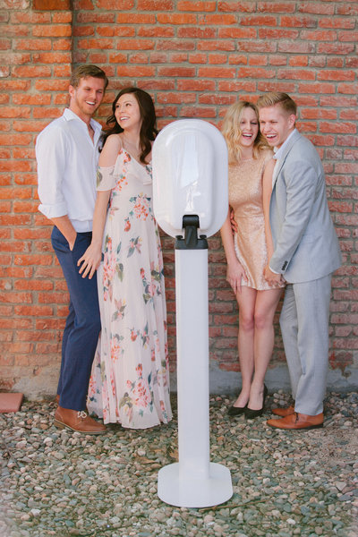 Guests enjoying the photo booth at a Bozeman wedding.
