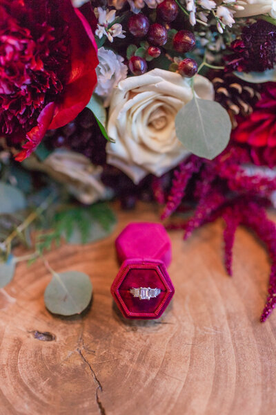 bridal bouquet and engagement ring