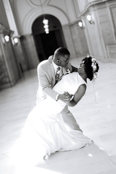 Bride and groom kiss after taking vows