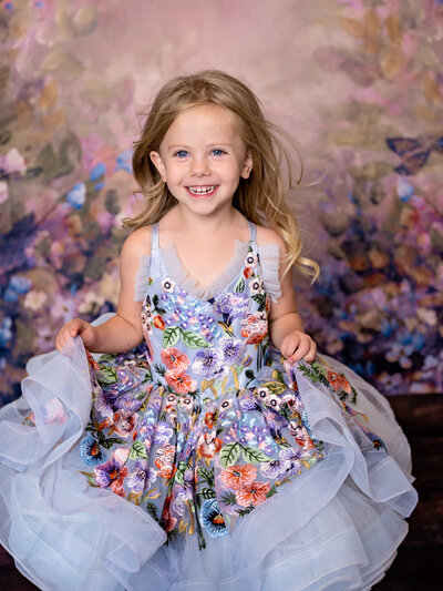 Little girl in couture dress in studio session with Prescott Arizona photographer Melissa Byrne