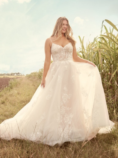 There's a love language to a romantic and simple V-neck chiffon bridal gown. So whatever your communication style, you can say a lot with a lace bodice, illusion details, and effortless jersey lining.