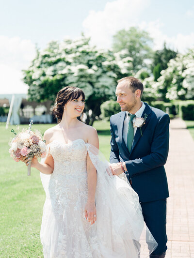Couple walking taken by wedding photographer in frederick md Nicole Simensky