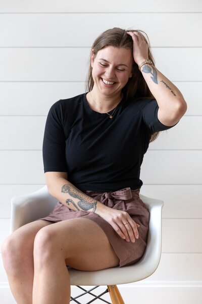 Owner of this website design company sitting for a moment in the sunlight.