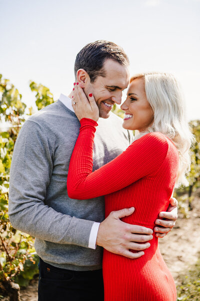 Couple embracing in vineyard