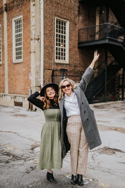 bride and groom bridal shoot kissing and laughing together