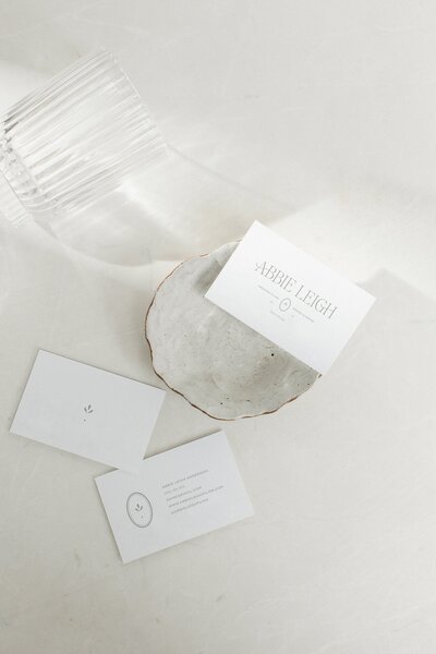 Wedding videographer logo on white neutral business cards