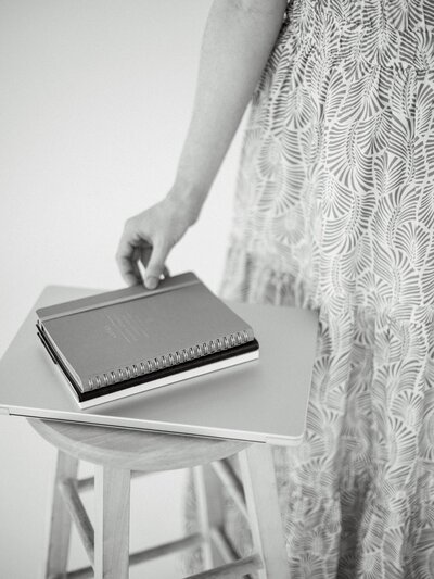 Laptop and designer books