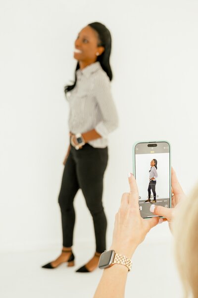 social media manger taking photos of a client 