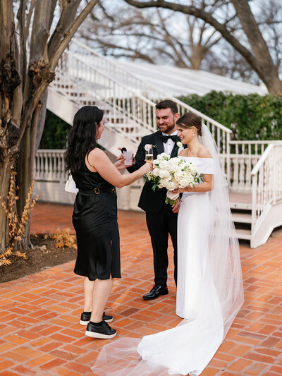 Austin wedding planners Bianca Nichole and Co helping bride and groom at wedding
