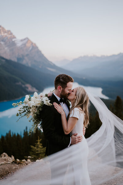 Couple sharing a kiss in Banff National Park