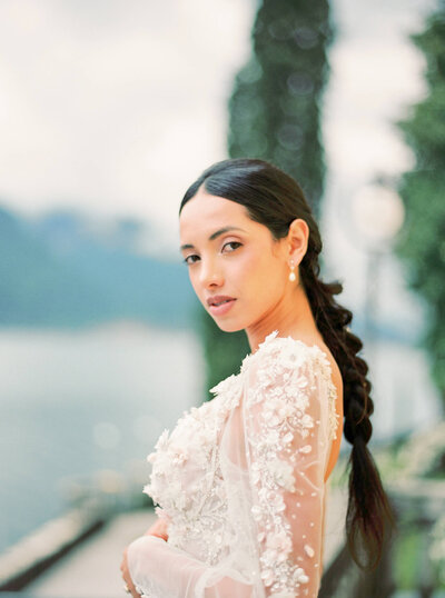 A wedding day bridal shot of a bride in her white dress at Villa Aura del Lago on lake como in Italy