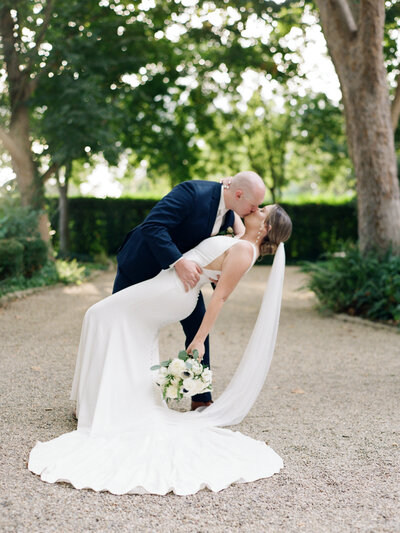 An intimate ceremony and elopement at their home church with their closes family members. A couple hand in hand embracing the intimate moments of their marriage.