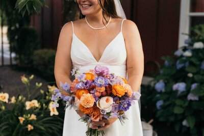 Colorful bridal bouquet by Flowers and Thyme.