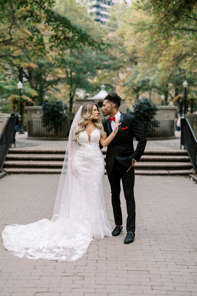 Bride and groom walk up memorial steps at their DC wedding
