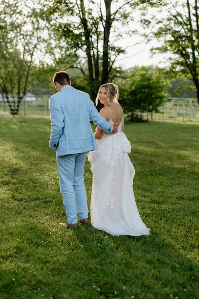 bride and groom walking together on their wedding day