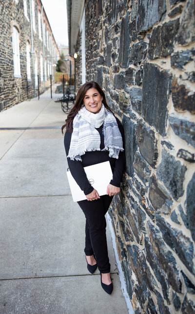 A-communications-consultant-poses-at-Artifact-Coffee-in-Hampden-Baltimore-Maryland-for-her-branding-photoshoot