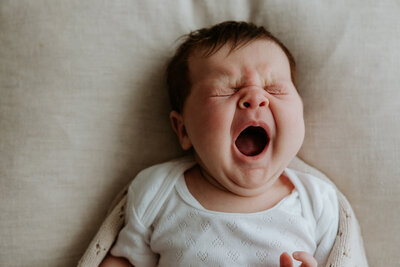 Yawning newborn baby